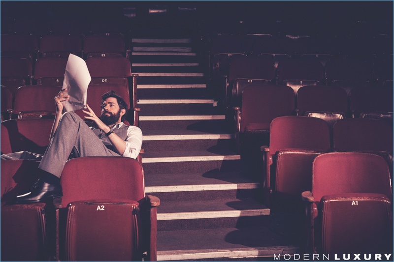 Relaxing at the theater, John Krasinski wears a Theory shirt with a vest and trousers by Joseph Abboud. He also dons a Brunello Cucinelli tie and Tod's dress shoes.