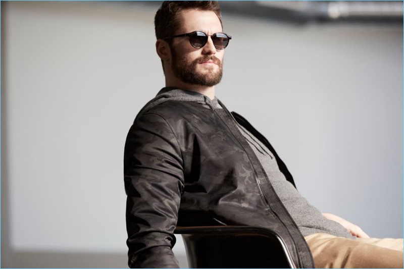 Going casual, Kevin Love wears a camouflage print jacket by Banana Republic.