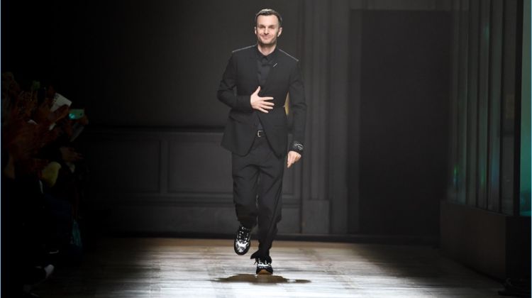 Kris Van Assche gives his final bow for Dior Homme on January 20, 2018 in Paris, France.