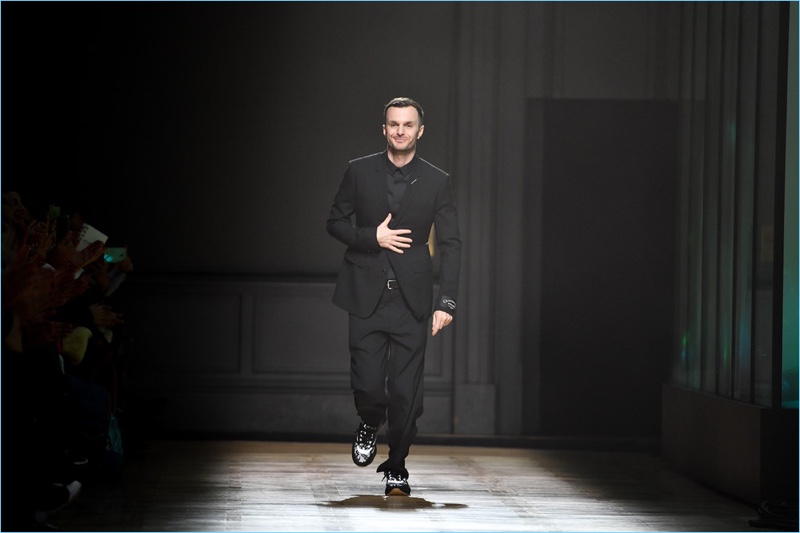 Kris Van Assche gives his final bow for Dior Homme on January 20, 2018 in Paris, France.