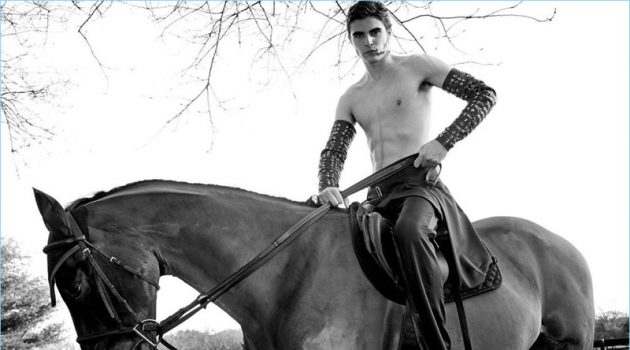 Diego Villarreal rides a horse for Les Hommes' spring-summer 2018 campaign.