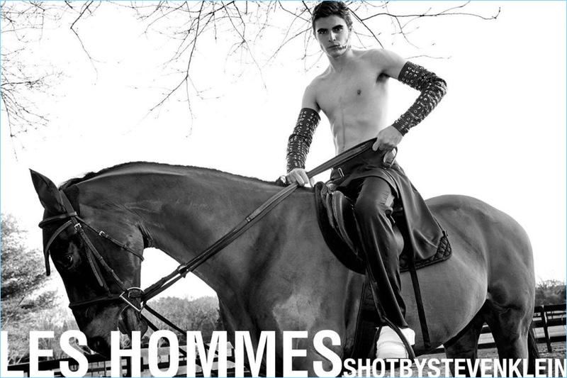 Diego Villarreal rides a horse for Les Hommes' spring-summer 2018 campaign.