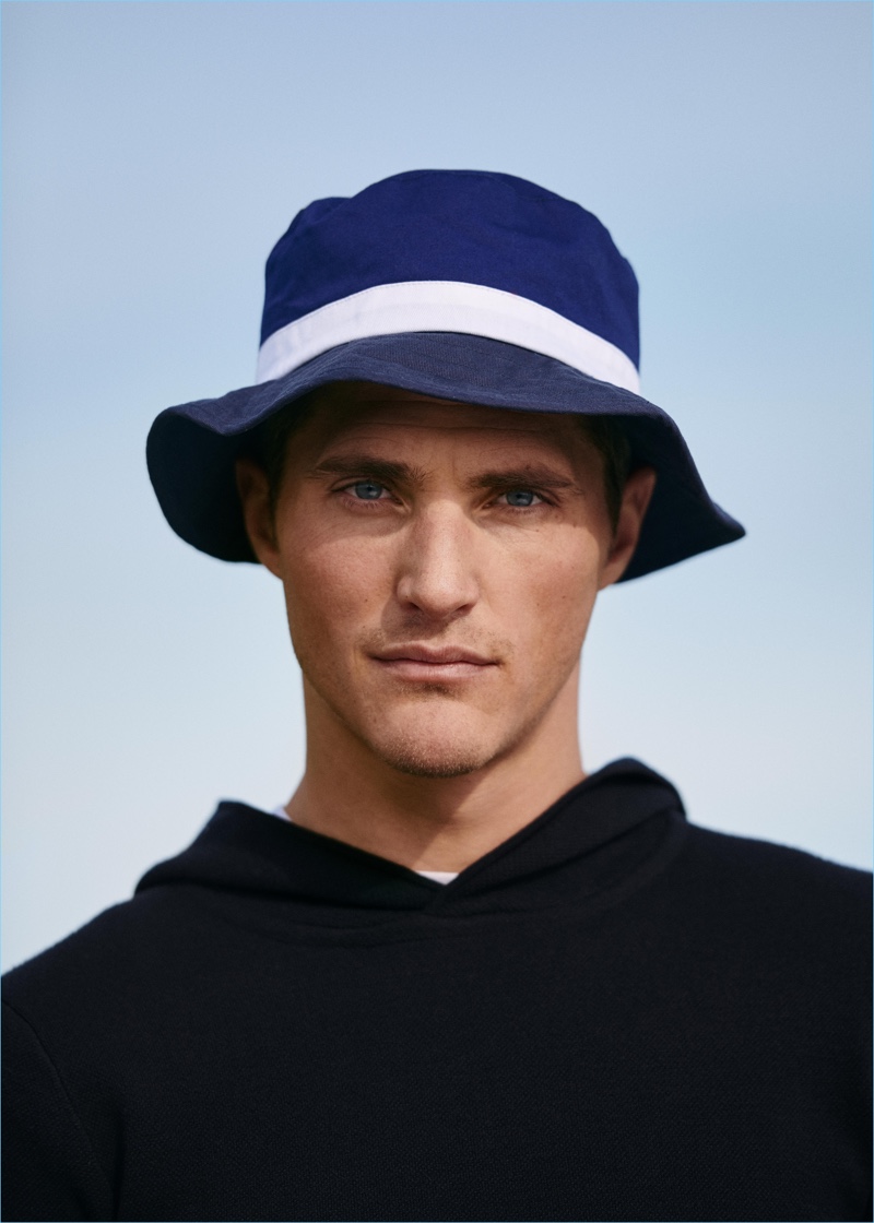 Sporting a bucket hat, Ollie Edwards stars in Mango's spring-summer 2018 lookbook.