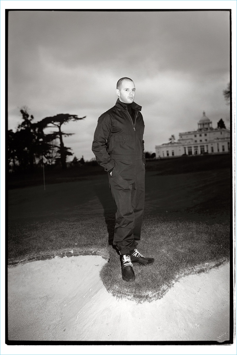 Making a definite style statement, Mike Skinner wears a Prada boiler suit with a Calvin Klein turtleneck sweater.