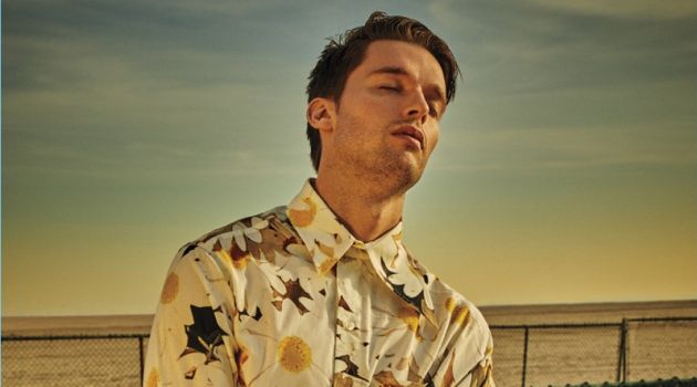 Patrick Schwarzenegger Connects with Flaunt, Talks 'Midnight Sun' Basking in the sun, Patrick Schwarzenegger wears an Alex Mullins shirt and Lanvin pants.