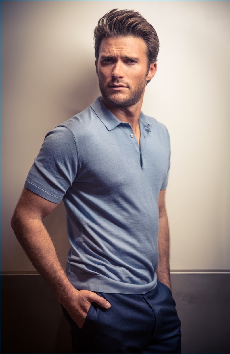 Starring in a new photo shoot, Scott Eastwood wears a COS polo and Giorgio Armani trousers.