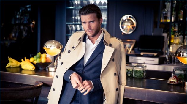 A striking vision, Scott Eastwood wears a Salvatore Ferragamo suit with a Burberry trench.
