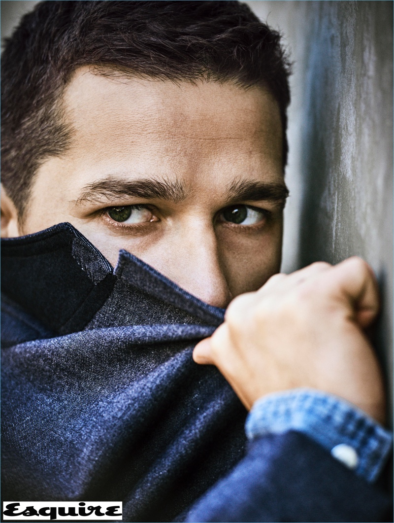 Starring in a new photo shoot, Shia LaBeouf wears a RRL jacket with a POLO Ralph Lauren shirt.