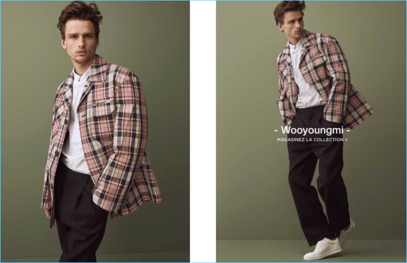 Making a statement in plaid, Simon Nessman dons Wooyoungmi.