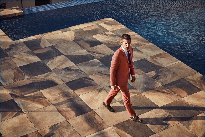 Donning a sleek coral suit, Tony Ward fronts Wormland's spring-summer 2018 campaign.