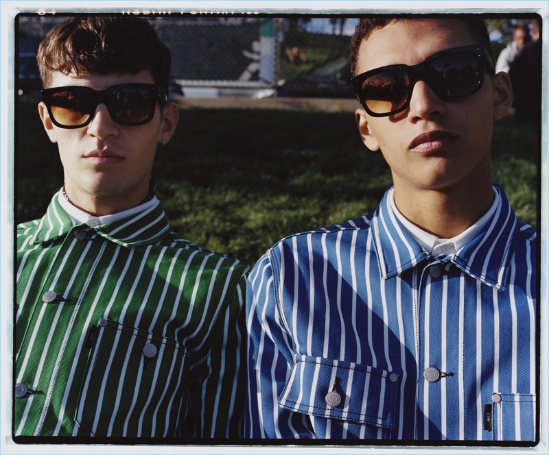 Donning striped jackets, Emin Akyildiz and Jackson Hale appear in AMI's spring-summer 2018 campaign.