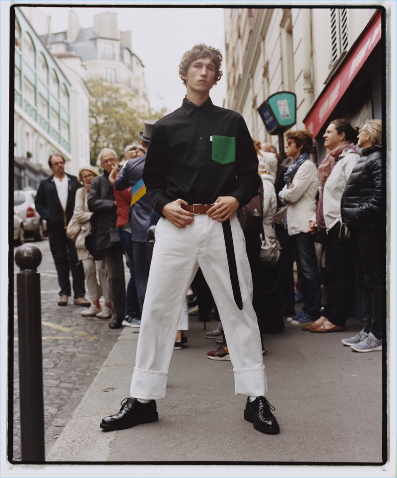 Etienne de Testa takes to the streets of Paris for AMI's spring-summer 2018 campaign.