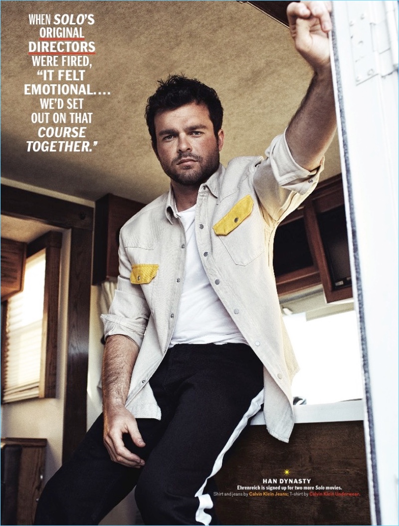 Embracing spring trends, Alden Ehrenreich is pictured in a Calvin Klein shirt and t-shirt.