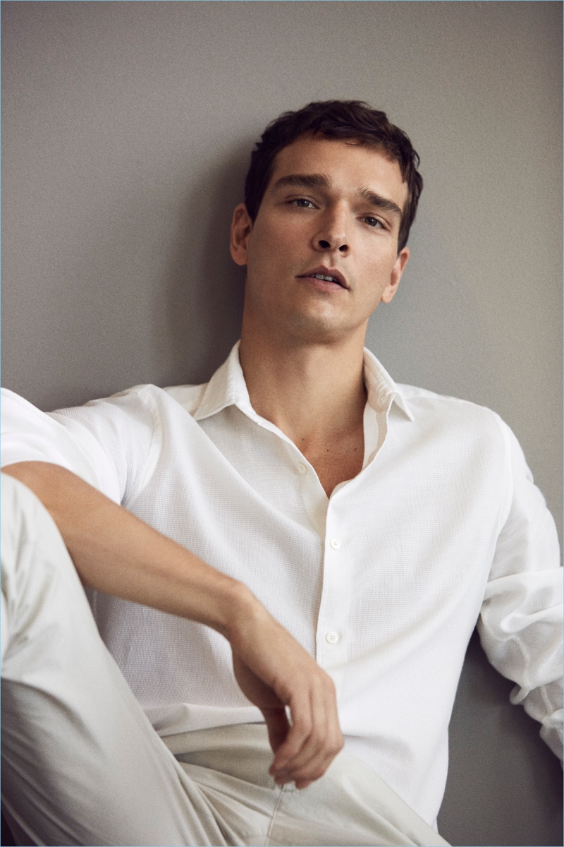 Brazilian model Alexandre Cunha dons a chic white look by Massimo Dutti.