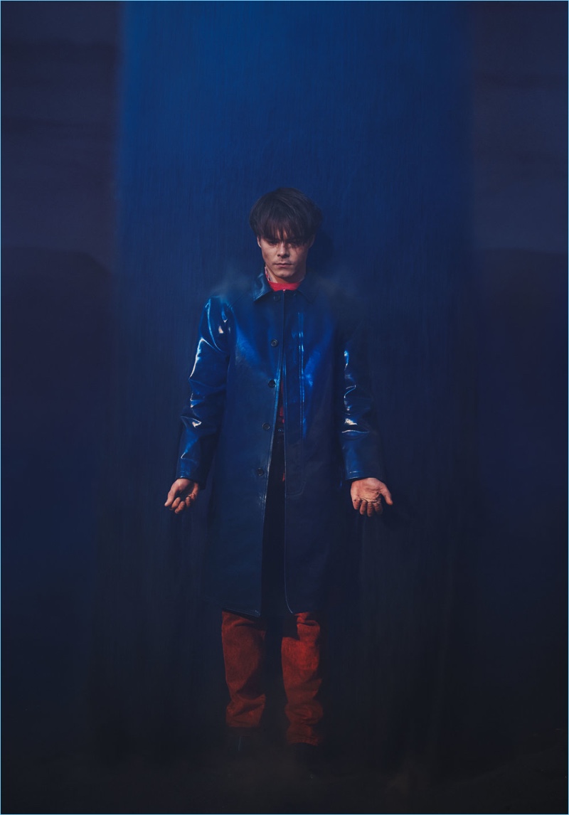 Embracing spring fashions, Charlie Heaton wears a Sies Marjan coat. The English actor also dons a Raf Simons top, Balenciaga jeans, and Jimmy Choo boots.