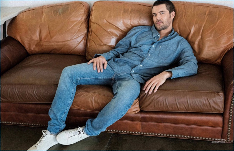 Doubling down on denim, Charlie Weber wears Levi's.