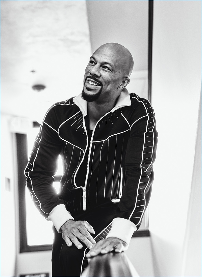All smiles, Common wears a jacket and pants by Valentino with a top from Joe's Jeans. 