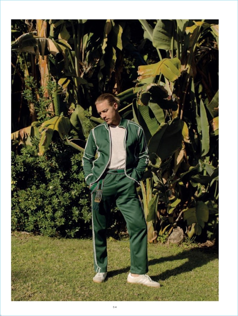 Going sporty, Diplo wears a Valentino tracksuit with a Billy Los Angeles t-shirt and Adidas sneakers. 