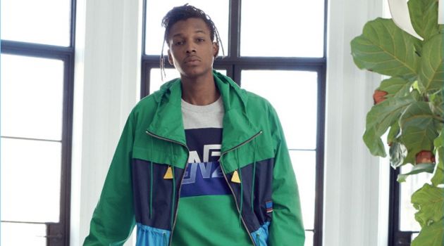New Wave: Matthew Davidson Models French Fashions for East Dane Going sporty, Matthew Davidson wears a parka, shorts, sweatshirt, and sneakers from Kenzo.