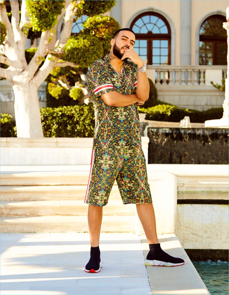 French Montana wears a tropical print shirt and shorts from his boohooMAN collaboration.