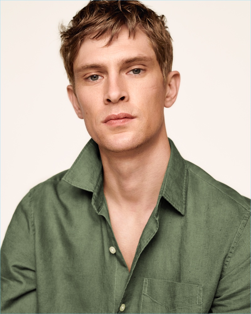 Danish model Mathias Lauridsen wears a Gap standard fit half-button shirt in linen-cotton.