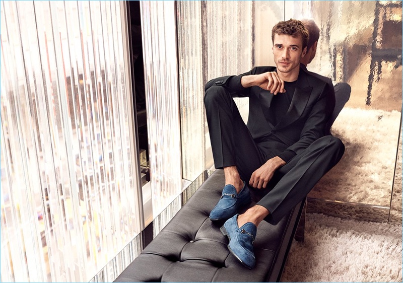 French model Clément Chabernaud wears suede loafers for Jimmy Choo's pre-fall 2018 campaign.