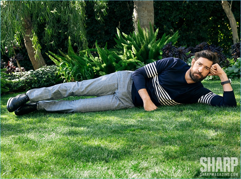 Connecting with Sharp magazine, John Krasinksi wears a Paul Smith shirt, AG pants, Rag & Bone shoes, and a Breitling watch.