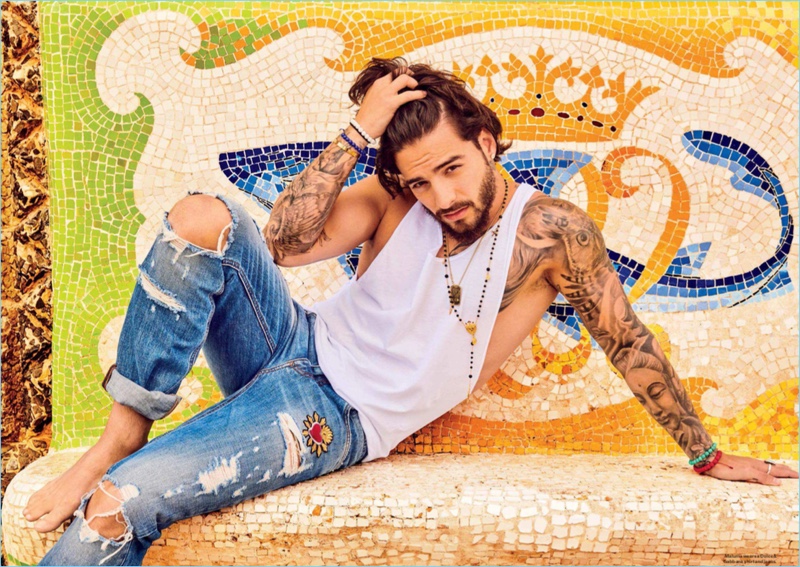 Rocking distressed denim, Maluma wears Dolce & Gabbana.