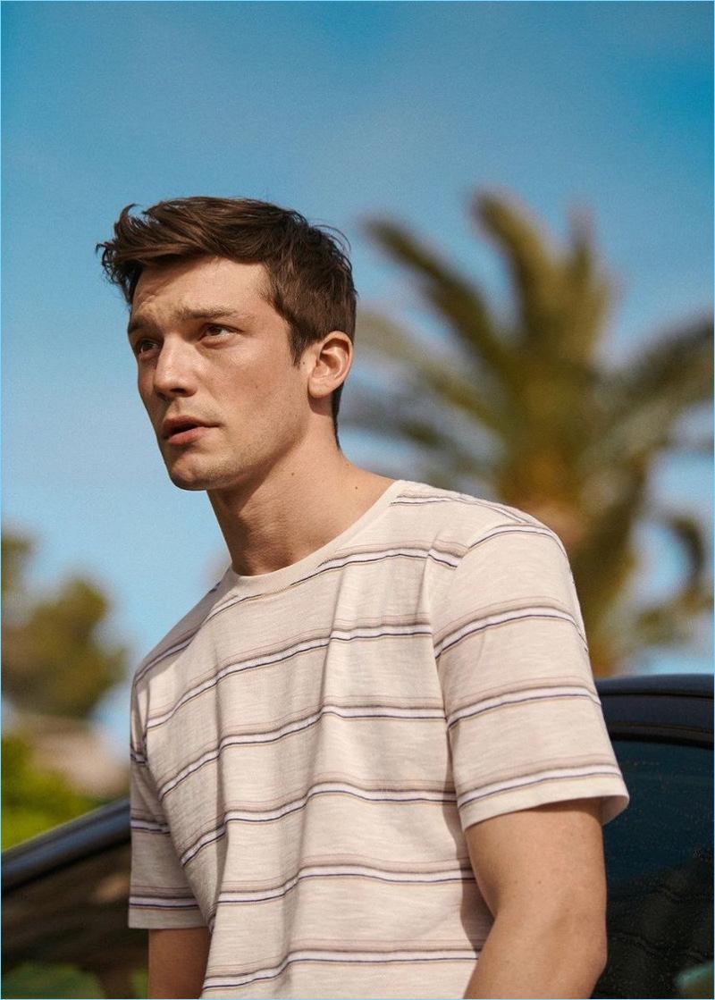 Alexis Petit dons a striped t-shirt from Mango Man.