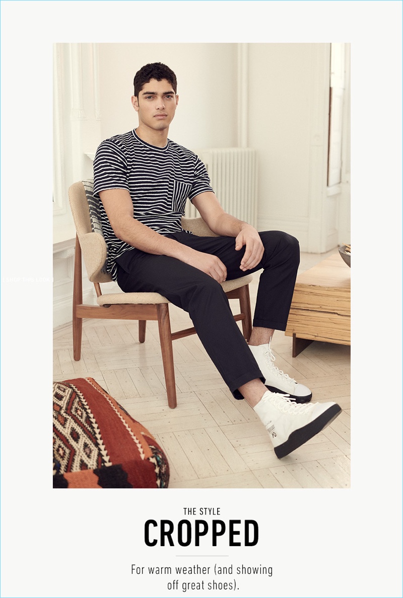 Keeping it simple, Torin Verdone wears a striped Norse Projects pocket tee and cropped chinos by Marni. Y-3 sneakers completes his look.
