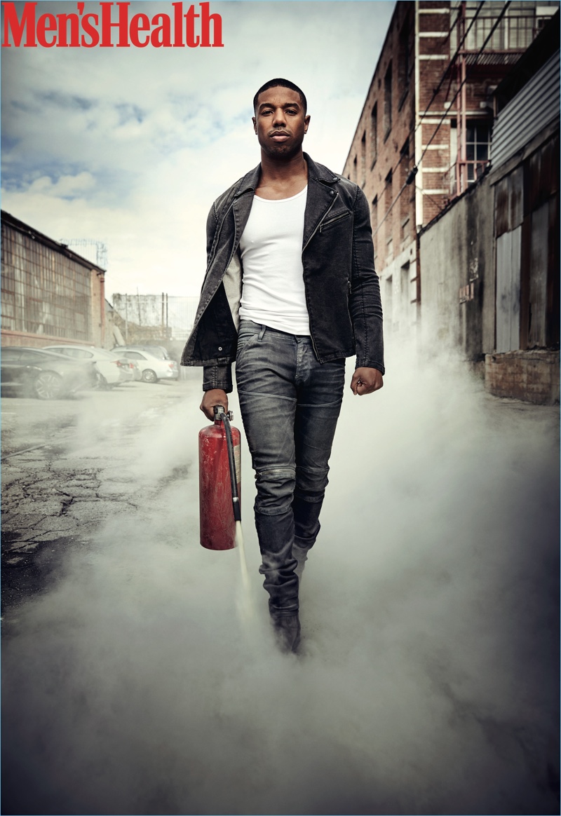 A cool vision, Michael B. Jordan wears a John Varvatos Star USA jacket, Mack Weldon tank, G-Star jeans, and To Boot New York boots.