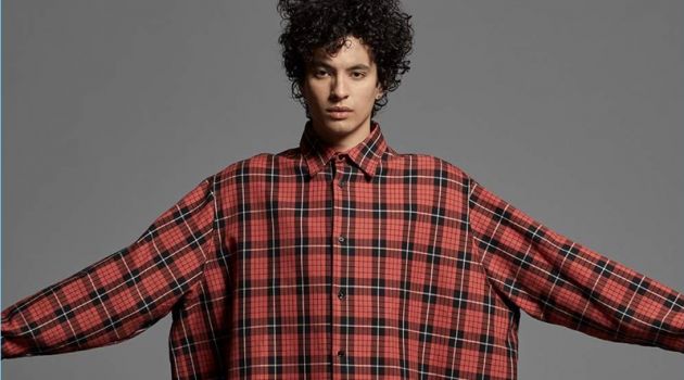 Mr Porter Endorses the Oversized Trend Liam Samuels sports an oversized Raf Simons tartan shirt, Visvim wide-leg cropped trousers, Balenciaga socks, and Rick Owens suede sneakers.