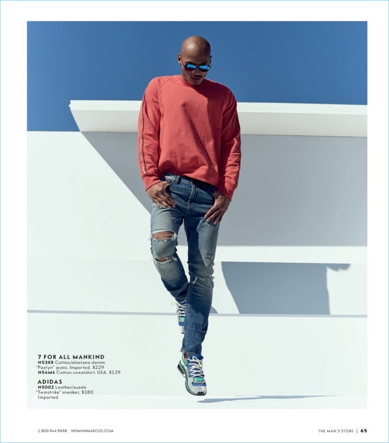 Embracing ripped denim, Paolo Roldan wears 7 For All Mankind with Adidas sneakers.