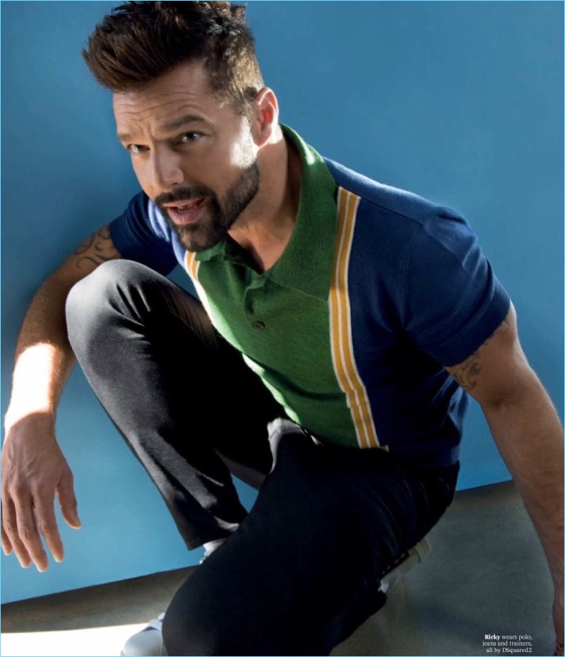 Singer Ricky Martin wears a polo, jeans, and sneakers by Dsquared2.