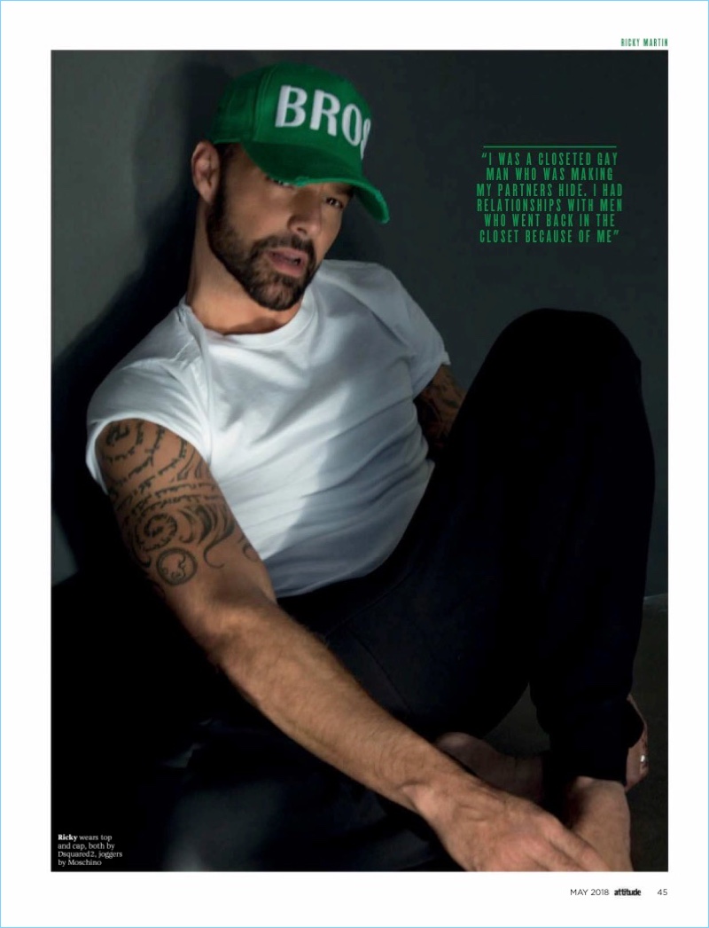 Connecting with Attitude, Ricky Martin wears Moschino joggers. He also sports a cap and t-shirt by Dsquared2.