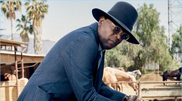 A cool vision, Samuel L. Jackson wears a Tom Ford suit with a Brunello Cucinelli shirt. He also rocks Common Projects boots and a vintage hat.
