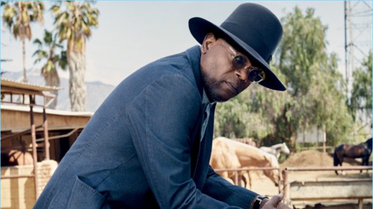 A cool vision, Samuel L. Jackson wears a Tom Ford suit with a Brunello Cucinelli shirt. He also rocks Common Projects boots and a vintage hat.