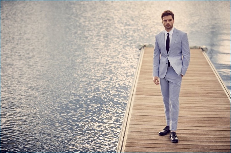 Stepping onto the board walk, Sebastian Stan appears in BOSS' "Summer of Ease" campaign.