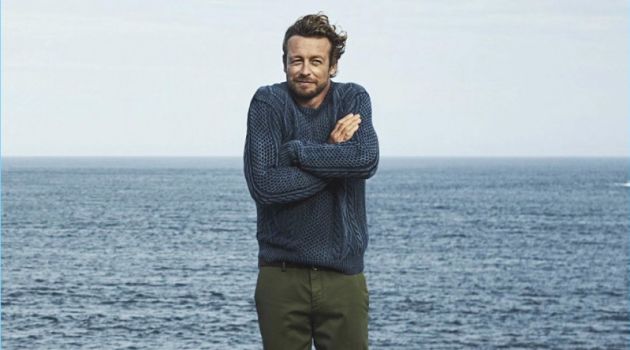 Actor Simon Baker wears a Ralph Lauren sweater and Prada pants.