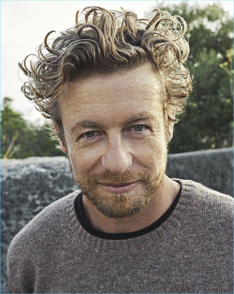Ready for his close-up, Simon Baker sports an Acne Studios sweater with a Commas t-shirt. 