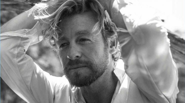 Appearing in a black and white photo, Simon Baker wears a Salvatore Ferragamo shirt.