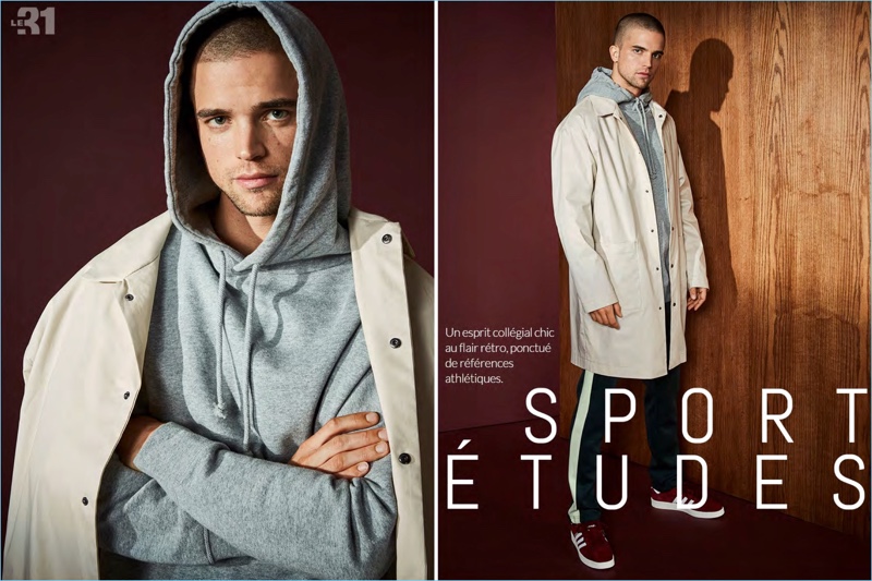 River Viiperi dons a LE 31 trench coat, hoodie, and joggers with Adidas Originals burgundy sneakers.