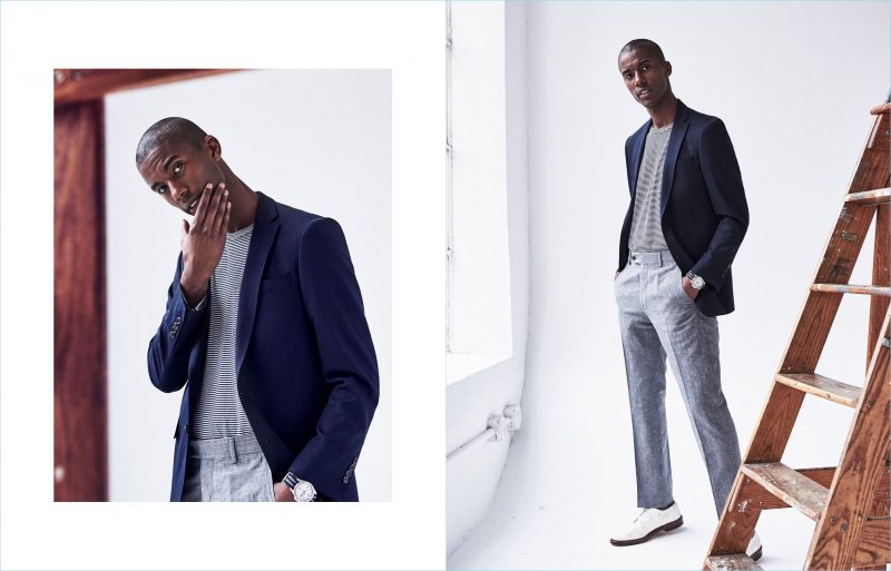 Linen & Stripes: A sleek vision, Claudio Monteiro wears a Todd Snyder suit jacket in navy with grey linen trousers. Tapping into a smart casual aesthetic, he also sports a Todd Snyder pocket tee.