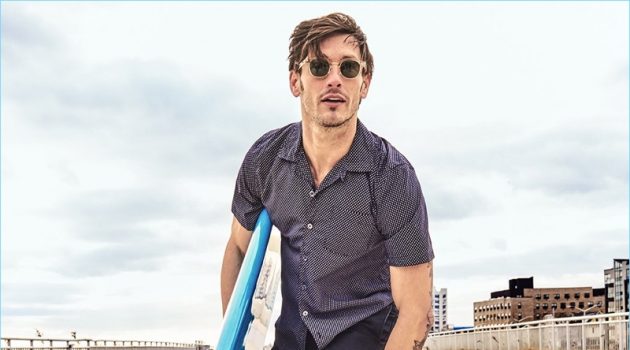 Parker Gregory Sports Summer Style by Todd Snyder Connecting with Todd Snyder, Parker Gregory wears a short-sleeve polka dot camp collar shirt with Japanese selvedge chinos.