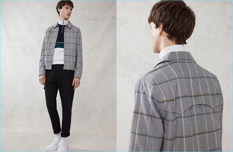 Model Ted Le Sueur wears a checked Harrington jacket by Topman.