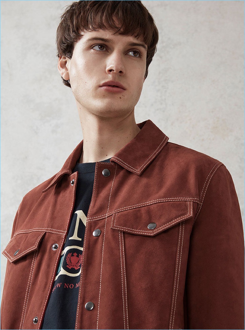 Making a statement in red, Ted Le Sueur models a Topman suede western jacket.