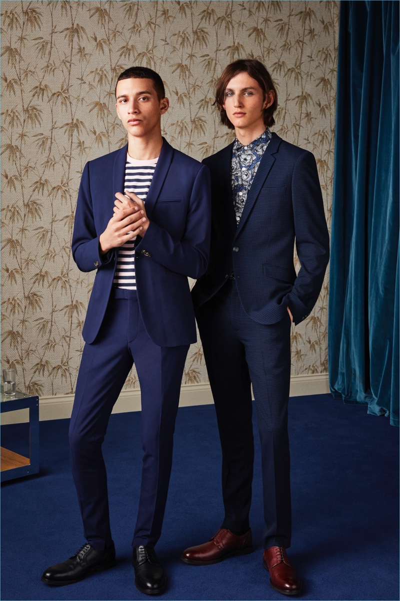 Models Jackson Hale and Henry Rausch don navy tailoring for Topman's spring-summer 2018 suiting campaign.