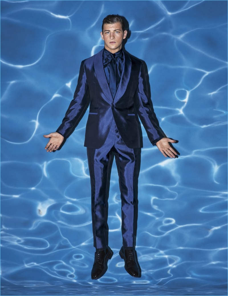Playing a Hollywood power agent, Tye Sheridan wears a Berluti suit, Giorgio Armani tie, and Jimmy Choo shoes.
