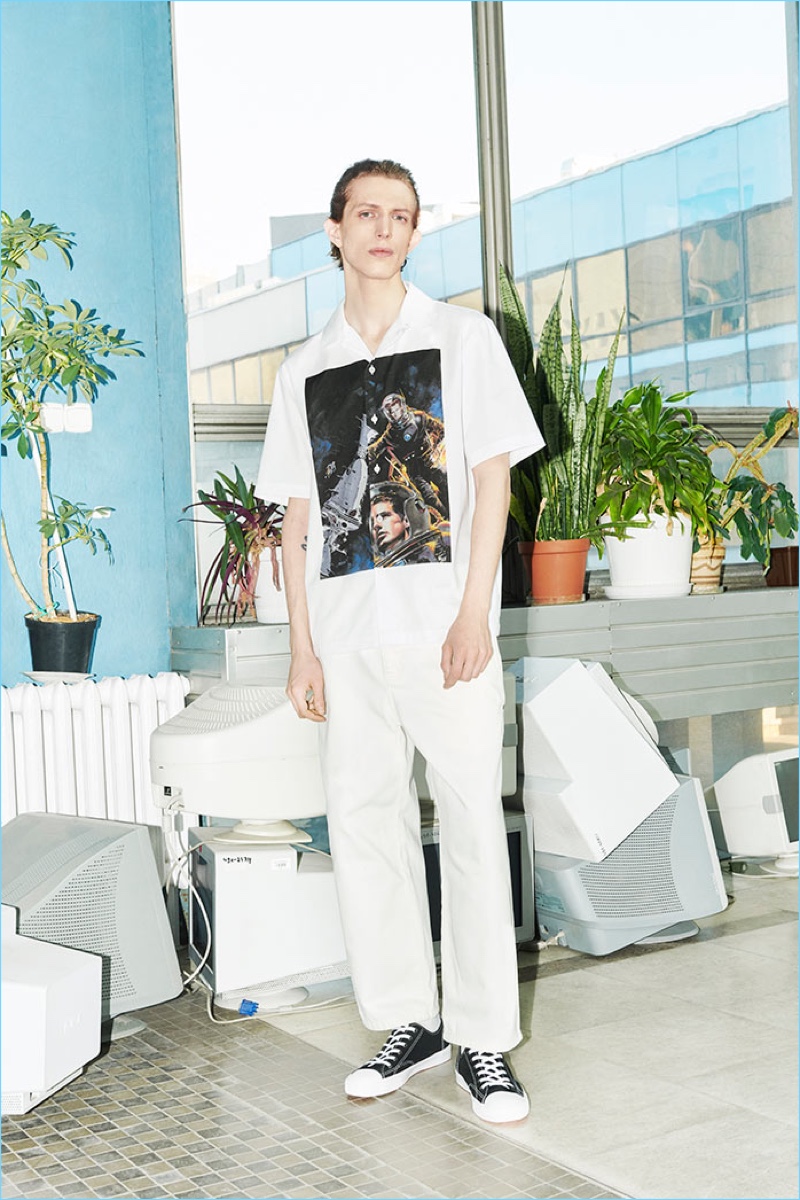 Embracing an all-white look, Xavier Buestel wears pieces from Reserved's Re.Design.02 collection.