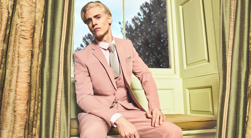 Oliver Stummvoll dons a sharp three-piece suit from boohooMAN.